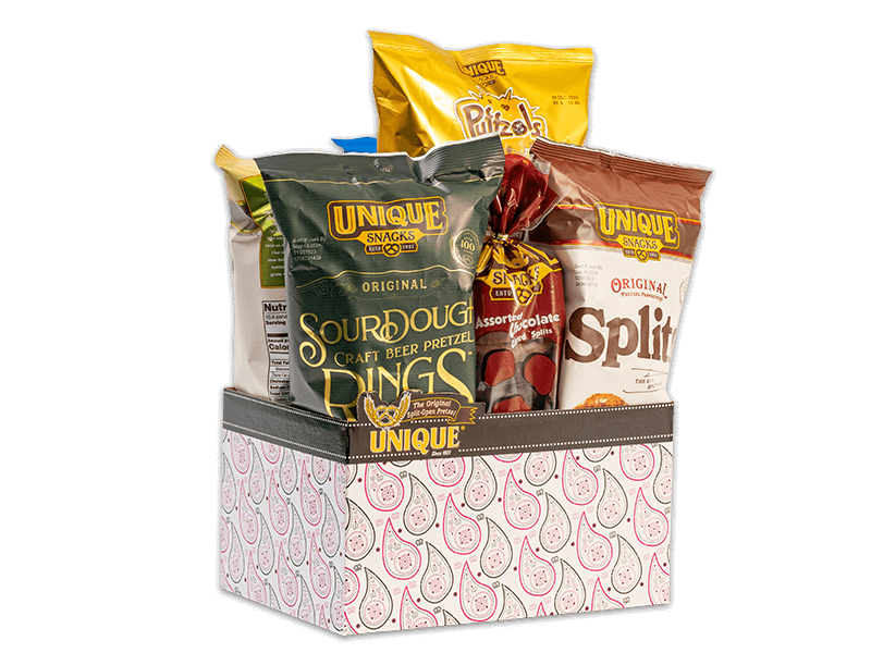 PAISLEYBX-pink-and-paisley-basket-box-full Pink and paisley basket box filled with various Unique Snacks products