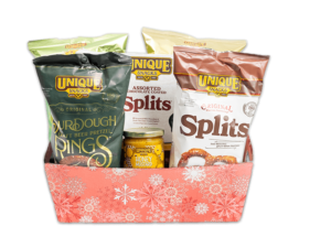 Large Red Snowflake Tray filled with various Unique Snacks products